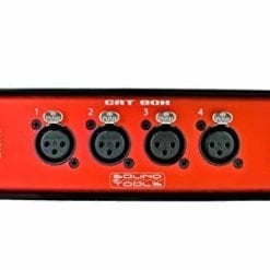 Red audio interface box with multiple input and output connectors for professional sound equipment.