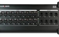 A professional audio interface with multiple input and output channels, featuring knob and switch controls for audio adjustments.