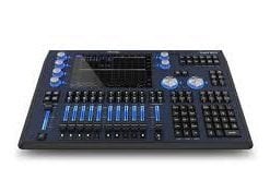 A modern digital audio mixing console with various knobs, sliders, and buttons on a white background.