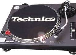 A classic technics turntable, ready to spin some vinyl records with style.