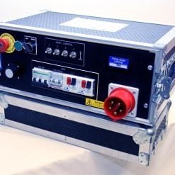 A portable, ruggedized electronic equipment case with various controls and connections, including a hoist control interface, voltage scope, and a large circular power connector.