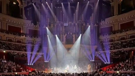Royal albert hall event with performer in lights